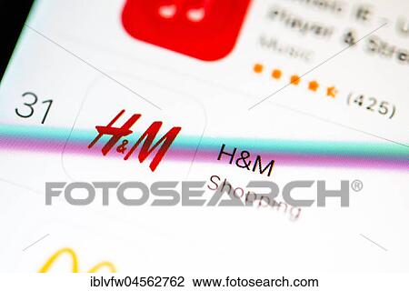 H&M App in the Apple App Store, online trading, display on a screen of a mobile phone, iPhone, iOS, smartphone, macro recording, detail, full format View Large Photo Image Stock Image - H&M App in the Apple App Store, online trading, display on a screen of a mobile phone, iPhone, iOS, smartphone, macro recording, detail, full format. Fotosearch