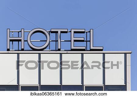 Stock Image - Hotel in front of a blue sky, Düsseldorf, North Rhine-Westphalia, Germany, Europe. Fotosearch