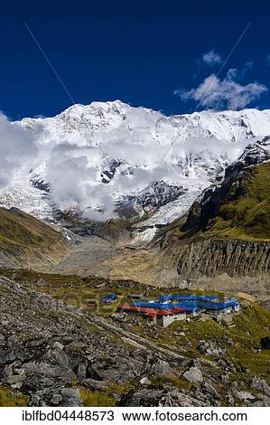 Houses of Annapurna Base Camp, glacier and the snow covered Annapurna 1 North Face, Chomrong, Kaski District, Nepal, Asia View Large Photo Image Stock Image - Houses of Annapurna Base Camp, glacier and the snow covered Annapurna 1 North Face, Chomrong, Kaski District, Nepal, Asia. Fotosearch