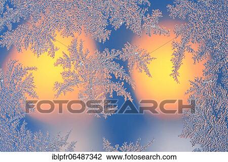 Ice flowers on glass pane in candlelight View Large Photo Image Stock Image - Ice flowers on glass pane in candlelight. Fotosearch