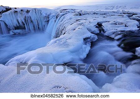 Stock Photograph - Ice waterfall in winter, Godafoss, Norðurland vestra, Northern Island, Island. Fotosearch
