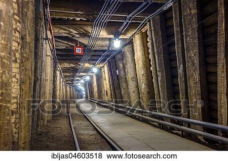 Stock Photo - Illuminated underground tunnel in old salt mine, Bochnia, Poland, Europe. Fotosearch