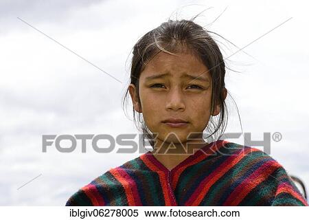Indigenous girl looks seriously into the camera, near Otavalo, Imbabura province, Ecuador, South America View Large Photo Image Stock Photography - Indigenous girl looks seriously into the camera, near Otavalo, Imbabura province, Ecuador, South America. Fotosearch
