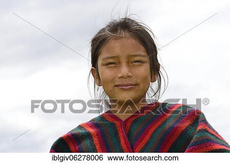 Indigenous girl looks smiling into the camera, near Otavalo, Imbabura province, Ecuador, South America View Large Photo Image Stock Photograph - Indigenous girl looks smiling into the camera, near Otavalo, Imbabura province, Ecuador, South America. Fotosearch