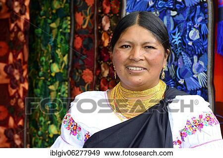 Stock Photo - Indigenous vendor at the handicraft market, Plaza de los Ponchos, Otavalo, Imbabura province, Ecuador, South America. Fotosearch