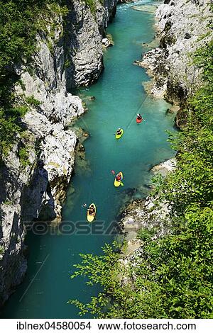 Picture - Kayaker on the river Soca, Kobarid, Slovenia, Europe. Fotosearch
