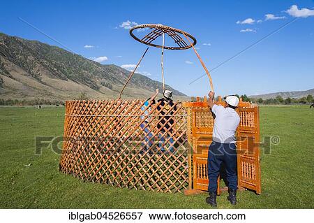 Kazakh men putting up a yurt, Sati village, Tien Shan Mountains, Kazakhstan, Asia View Large Photo Image Stock Photo - Kazakh men putting up a yurt, Sati village, Tien Shan Mountains, Kazakhstan, Asia. Fotosearch