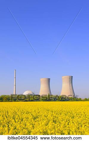 Kernpower plant Grafenrheinfeld, in front of rape field, Lower Franconia, Bavaria, Germany, Europe View Large Photo Image Stock Photography - Kernpower plant Grafenrheinfeld, in front of rape field, Lower Franconia, Bavaria, Germany, Europe. Fotosearch