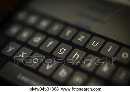 Keyboard, touch screen, luminous display, screen, iPhone, cell phone, smartphone, iOS, macro shot, detail, full frame View Large Photo Image Stock Photo - Keyboard, touch screen, luminous display, screen, iPhone, cell phone, smartphone, iOS, macro shot, detail, full frame. Fotosearch
