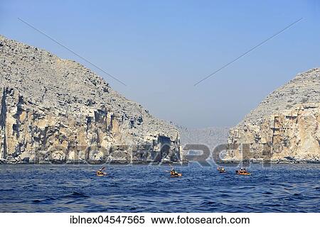 Stock Photography - Khasab, boat trip with a dhow into the fjord landscape, Musandam, Oman, Asia. Fotosearch
