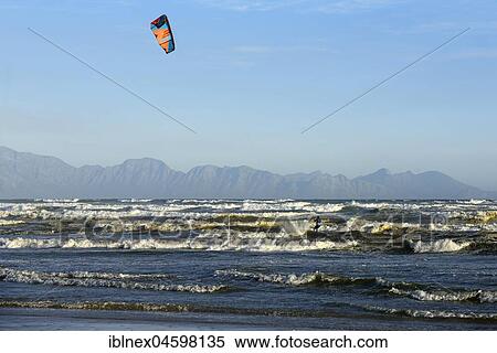 Kitesurfers at high waves, near Muizenberg, False Bay, Western Cape, South Africa, Africa View Large Photo Image Stock Photography - Kitesurfers at high waves, near Muizenberg, False Bay, Western Cape, South Africa, Africa. Fotosearch