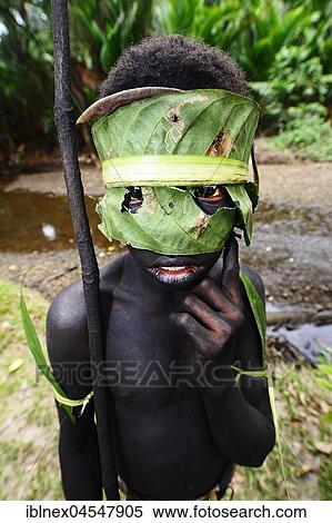 Korafe-child with facial and headdress made of leaves, McLaren-Harbour, Tufi, Papua New Guinea, Oceania View Large Photo Image Stock Photography - Korafe-child with facial and headdress made of leaves, McLaren-Harbour, Tufi, Papua New Guinea, Oceania. Fotosearch