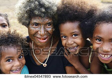 Stock Image - Korafe tribe, woman with her children, Tufi, Papua New Guinea, Oceania. Fotosearch