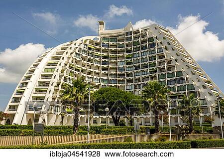 Stock Photo - La Grande Motte marina, Grande Pyramide apartment building designed by architect Jean Balladur, Département Hérault, Okzitanien, Frankreich. Fotosearch
