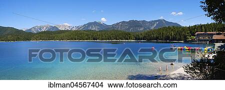 Picture - Lake Eibsee lake and Ammergau Alps with Schellschlicht, Scharfeck, Rauheck and Hoher Ziegspitz, near Grainau, Werdenfelser Land, Upper Bavaria, Bavaria, Germany, Europe. Fotosearch