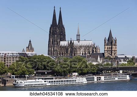 Landing bridge on the Rhine bank, with town hall, cathedral, church Groß St. Martin, Cologne, North Rhine-Westphalia, Germany, Europe View Large Photo Image Stock Photo - Landing bridge on the Rhine bank, with town hall, cathedral, church Groß St. Martin, Cologne, North Rhine-Westphalia, Germany, Europe. Fotosearch