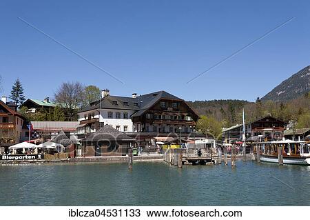 Stock Image - Landing stage with hotel Schiffmeister, Schönau on the Königssee, Berchtesgaden, Bavaria, Germany, Europe. Fotosearch