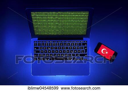 Stock Photo - Laptop, symbolic image, cybercrime, computer crime, computer hacker, data security, Turkish flag on smartphone. Fotosearch