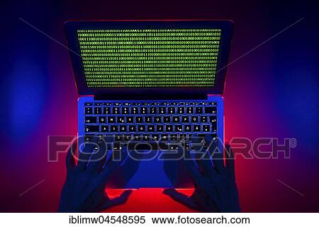 Stock Photography - Laptop, symbolic image, cybercrime, computer crime, computer hacker, data security. Fotosearch
