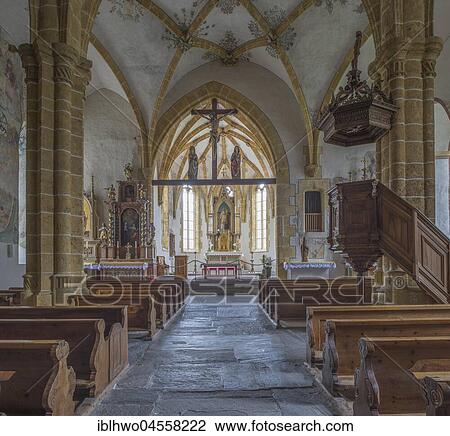 Stock Image - Late medieval castle church of St. Romanus, interior shot, tomb of the poet Rainer Maria Rilke, Rhonetal, Raron, Valais, Switzerland, Europe. Fotosearch