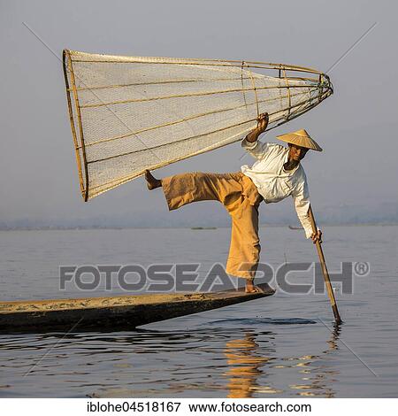 Leg rowing style, Intha fishermen on Inle Lake, Myanmar, Asia View Large Photo Image Stock Photo - Leg rowing style, Intha fishermen on Inle Lake, Myanmar, Asia. Fotosearch