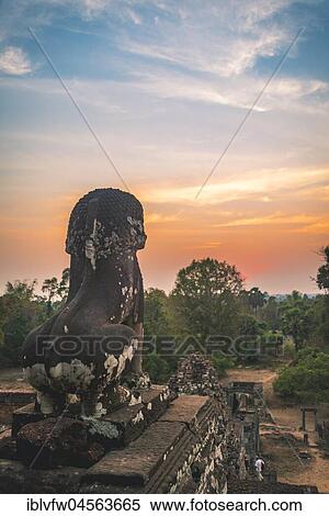 Lion figure as guardian, temple ruin at sunset, Pre Rup temple, Angkor Archaeological Park, province of Siem Reap, Cambodia, Asia View Large Photo Image Stock Photography - Lion figure as guardian, temple ruin at sunset, Pre Rup temple, Angkor Archaeological Park, province of Siem Reap, Cambodia, Asia. Fotosearch