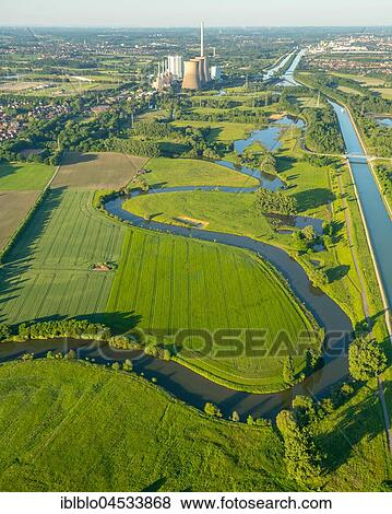 Lippe river and Lippenauen western of the Gersteinwerk, motorway A1, Gersteinwerk, Inogy, RWE Power, coal-power station in Werne-Stockum on the city boundary to Hamm, Datteln-Hamm-Kanal, aerial photo, Werne, Ruhr Area, North Rhine-Westphalia, Germany,... View Large Photo Image Stock Photo - Lippe river and Lippenauen western of the Gersteinwerk, motorway A1, Gersteinwerk, Inogy, RWE Power, coal-power station in Werne-Stockum on the city boundary to Hamm, Datteln-Hamm-Kanal, aerial photo, Werne, Ruhr Area, North Rhine-Westphalia, Germany,.... Fotosearch