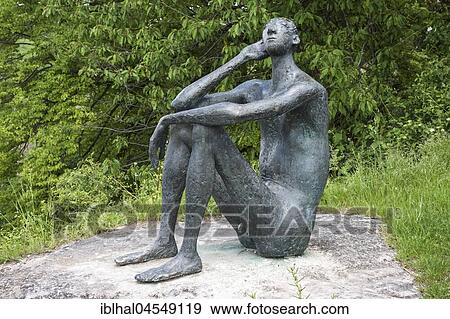 Stock Photo - Listening Man, bronze sculpture by Prof. Fritz Nuss, 1966, Strümpfelbach Sculpture Path, Baden-Württemberg, Germany, Europe. Fotosearch