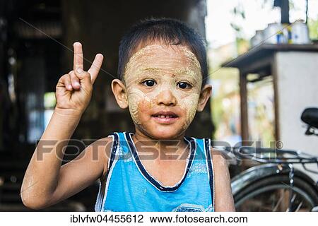 Little native boy posing, victory sign, V sign, peace, portrait, Yangon, Myanmar, Asia View Large Photo Image Stock Image - Little native boy posing, victory sign, V sign, peace, portrait, Yangon, Myanmar, Asia. Fotosearch