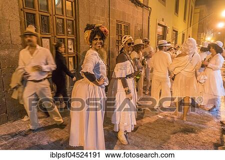 Lively Carnival visitors, white powder and white clothes, evening mood, Carnival La Fiesta de los Indianos, Las Palmas de Gran Canaria, Canary Islands, Spain, Europe View Large Photo Image Stock Image - Lively Carnival visitors, white powder and white clothes, evening mood, Carnival La Fiesta de los Indianos, Las Palmas de Gran Canaria, Canary Islands, Spain, Europe. Fotosearch