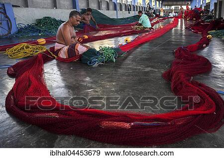 Local men repairing fishing nets in hall at harbour, Beruwela, Western Province, Sri Lanka, Asia View Large Photo Image Stock Photo - Local men repairing fishing nets in hall at harbour, Beruwela, Western Province, Sri Lanka, Asia. Fotosearch