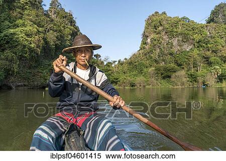 Local rowers on the lake near Saddan Cave, Hpa-an, Myanmar, Asia View Large Photo Image Stock Photography - Local rowers on the lake near Saddan Cave, Hpa-an, Myanmar, Asia. Fotosearch
