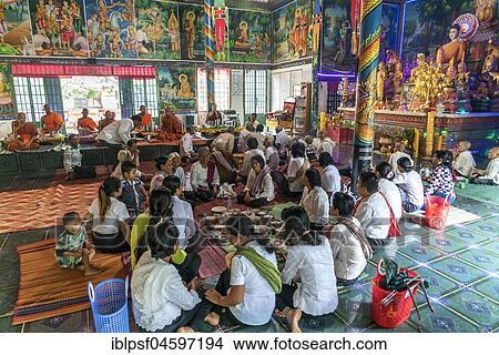 Locals eating together in the temple of Phnom Sasear, near Kampot, Cambodia, Asia View Large Photo Image Picture - Locals eating together in the temple of Phnom Sasear, near Kampot, Cambodia, Asia. Fotosearch