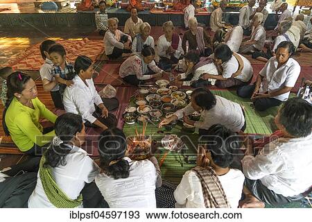 Locals eating together in the temple of Phnom Sasear, near Kampot, Cambodia, Asia View Large Photo Image Stock Image - Locals eating together in the temple of Phnom Sasear, near Kampot, Cambodia, Asia. Fotosearch
