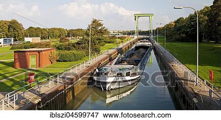 Lock Friedrichsfeld with cargo ship, Wesel-Datteln-Canal, Voerde, Lower Rhine, Ruhr area, North Rhine-Westphalia, Germany, Europe View Large Photo Image Stock Photo - Lock Friedrichsfeld with cargo ship, Wesel-Datteln-Canal, Voerde, Lower Rhine, Ruhr area, North Rhine-Westphalia, Germany, Europe. Fotosearch