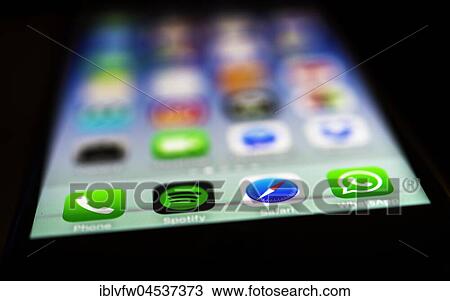 Luminous display, screen, iPhone, many different app icons, app, cell phone, smartphone, iOS, macro shot, detail, full frame View Large Photo Image Stock Image - Luminous display, screen, iPhone, many different app icons, app, cell phone, smartphone, iOS, macro shot, detail, full frame. Fotosearch