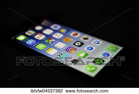 Luminous display, screen, iPhone, many different app icons, app, cell phone, smartphone, iOS, macro shot, detail, full frame View Large Photo Image Stock Image - Luminous display, screen, iPhone, many different app icons, app, cell phone, smartphone, iOS, macro shot, detail, full frame. Fotosearch