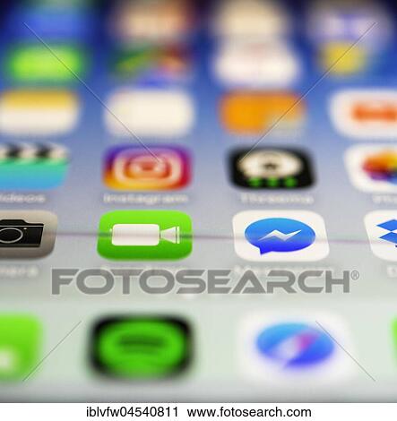Luminous display, screen, iPhone, many different app icons, app, cell phone, smartphone, iOS, macro shot, detail, full frame View Large Photo Image Stock Image - Luminous display, screen, iPhone, many different app icons, app, cell phone, smartphone, iOS, macro shot, detail, full frame. Fotosearch