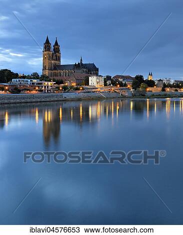 Stock Image - Magdeburger Dom at the river Elbe, twilight, Magdeburg, Saxony-Anhalt, Germany, Europe. Fotosearch