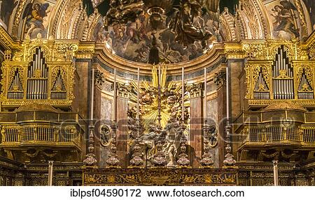 Magnificent organ loft with Saint Trinity, St. John's Co-Cathedral, Valletta, Malta, Europe View Large Photo Image Stock Image - Magnificent organ loft with Saint Trinity, St. John's Co-Cathedral, Valletta, Malta, Europe. Fotosearch