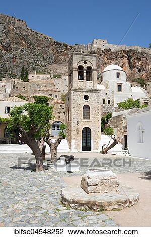 Main square with bell tower of the Byzantine Greek Orthodox church Christos Elkomenos, lower town, old town, Monemvasia, Lakonia, Peloponnese, Greece, Europe View Large Photo Image Stock Image - Main square with bell tower of the Byzantine Greek Orthodox church Christos Elkomenos, lower town, old town, Monemvasia, Lakonia, Peloponnese, Greece, Europe. Fotosearch