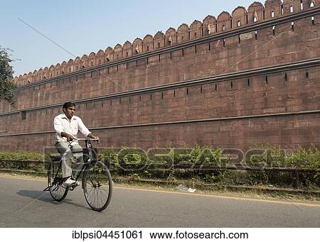 Man on bicycle in front of Red Fort, Old Delhi, Delhi, India, Asia View Large Photo Image Stock Image - Man on bicycle in front of Red Fort, Old Delhi, Delhi, India, Asia. Fotosearch