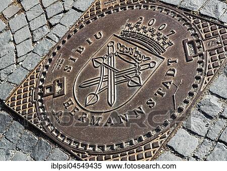 Stock Photography - Manhole cover, Sibiu, Hermannstadt, Romania, Europe. Fotosearch