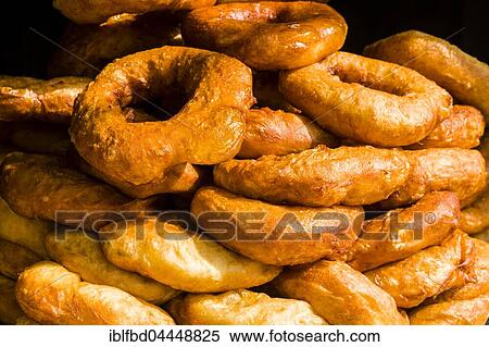 Many fresh doughnuts are piled up for sale, Bandipur, Tanahun District, Nepal, Asia View Large Photo Image Stock Photography - Many fresh doughnuts are piled up for sale, Bandipur, Tanahun District, Nepal, Asia. Fotosearch