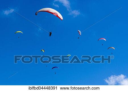 Many paragliders are flying in the air, over Pokhara and Phewa Lake, Sarangkot, Kaski District, Nepal, Asia View Large Photo Image Stock Image - Many paragliders are flying in the air, over Pokhara and Phewa Lake, Sarangkot, Kaski District, Nepal, Asia. Fotosearch