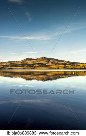 Stock Image - Massif of Sancy and lake Chauvet in autumn, Auvergne Volcanoes Natural Park, Puy de Dome department, Auvergne-Rhone-Alpes, France, Europe. Fotosearch