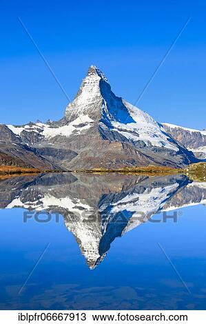 Stock Image - Matterhorn and mountain lake, Valais, Switzerland, Europe. Fotosearch