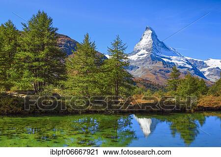 Stock Image - Matterhorn and mountain lake, Valais, Switzerland, Europe. Fotosearch