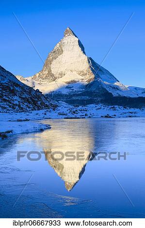 Stock Image - Matterhorn and mountain lake, Valais, Switzerland, Europe. Fotosearch