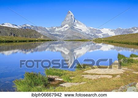 Matterhorn and mountain lake, Valais, Switzerland, Europe View Large Photo Image Stock Image - Matterhorn and mountain lake, Valais, Switzerland, Europe. Fotosearch